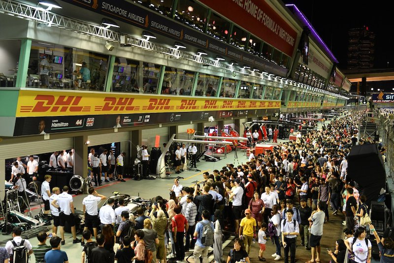 A crowded Singapore grand prix pit lane